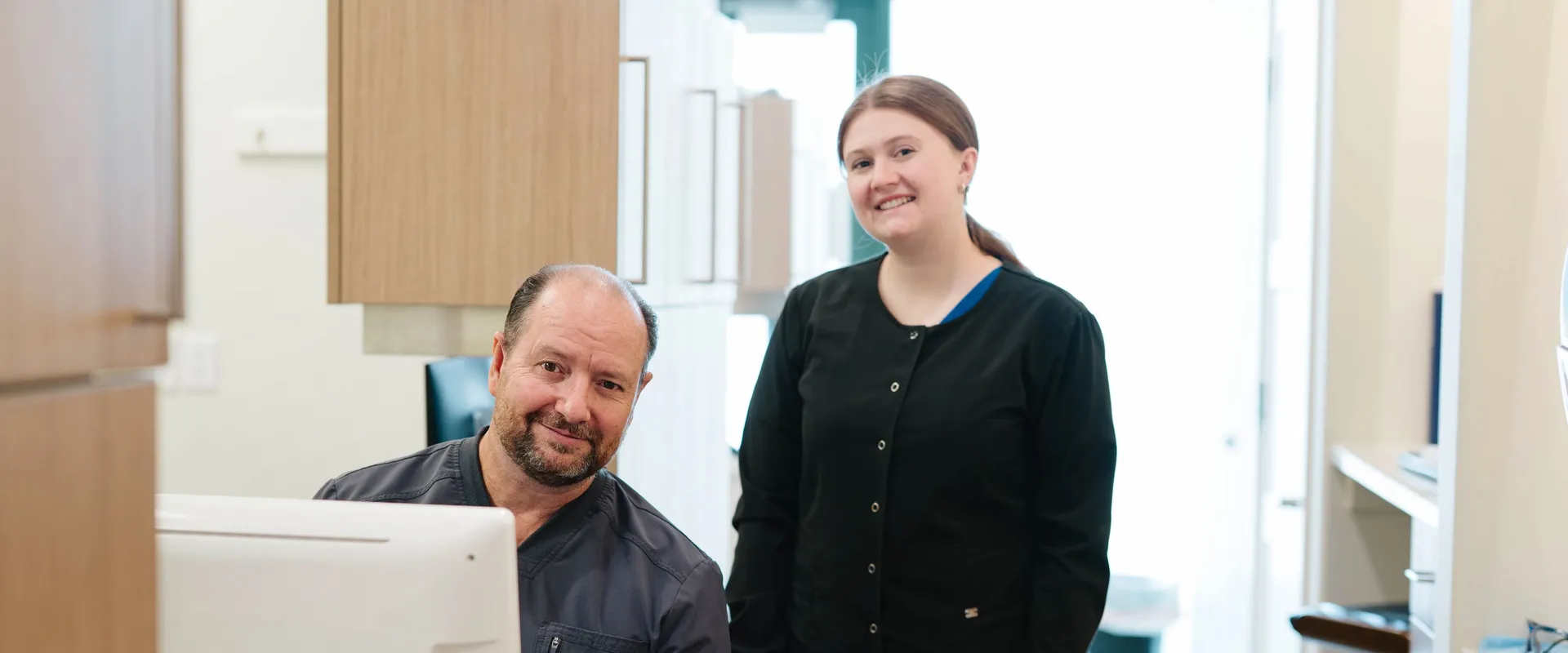 Dr. Swenson and team member at CrossPointe Dental
