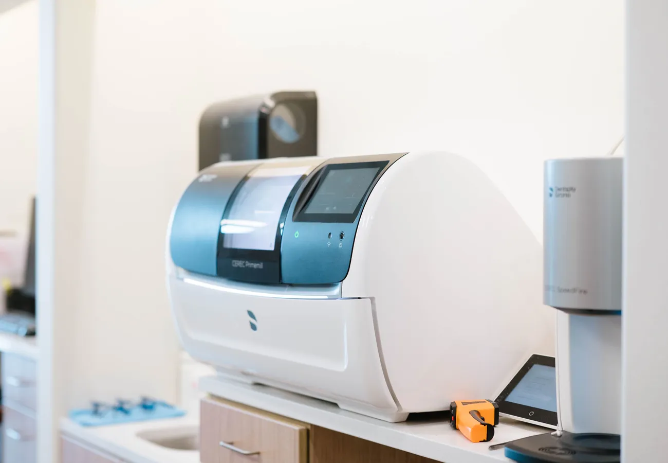 Close-up of the CEREC same-day crown milling equipment at CrossPointe Dental